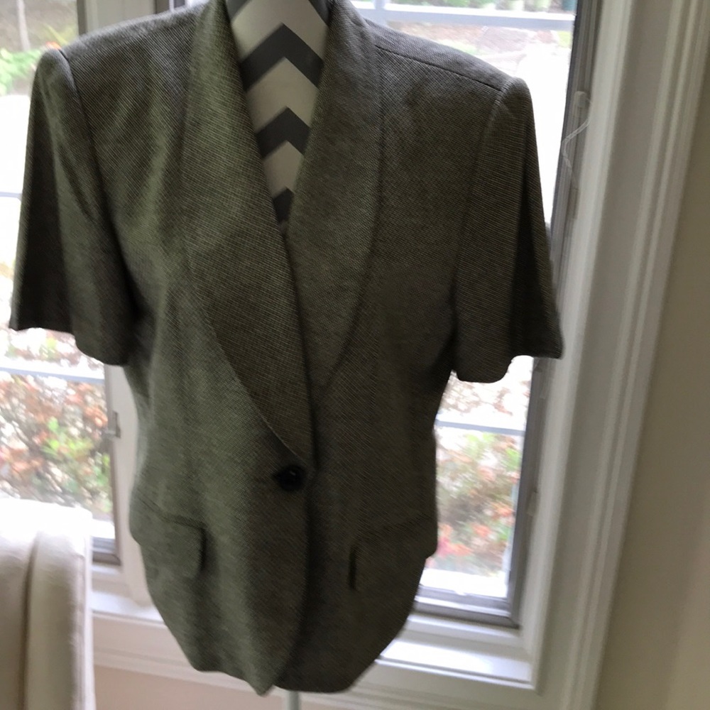 S/sl tweed look jacket. Silk and rayon.